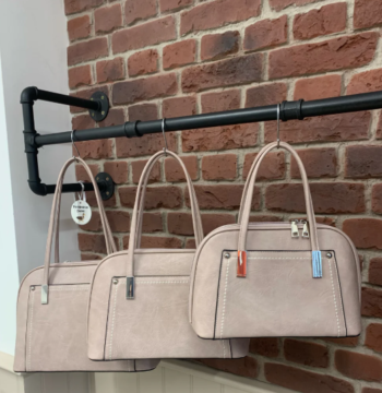 Pink handbag with white stitch detail